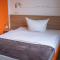 Orange Hotel und Apartments