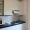 Lovely bright flat few steps away from the beach