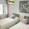 Apartamento Playa Xoriguer con piscina y jardin