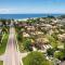 Cozy Condo less than 3 min walk to White Sandy Beaches - هولمز بيتش