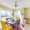 Pleasant ocean view home with balcony, rocking chairs, soaking tub, AC, & W/D