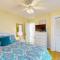 Pleasant ocean view home with balcony, rocking chairs, soaking tub, AC, & W/D