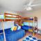 Pleasant ocean view home with balcony, rocking chairs, soaking tub, AC, & W/D