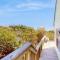 Pleasant ocean view home with balcony, rocking chairs, soaking tub, AC, & W/D