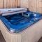 Backyard bbq amazing hot tub1