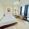 1 Queen Bed & 2 double beds at One Uptown Residences with XBOX and Netflix - 马尼拉