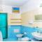 Casa Vacanze MIMOSA La Maddalena con parcheggio privato e vista mare