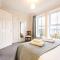 Spacious 4-bedroom townhouse in the city center with free parking