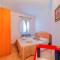 Casa Vacanze MIMOSA La Maddalena con parcheggio privato e vista mare