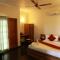 ZIONS AIRPORT HOTEL AND APERTMENT! Near Kempegowda International Airport