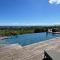 Villa Deluxe lHacienda Villa vue mer 180 piscine jacuzzi proche plage marina golf pointe des châteaux et casino jardin clos voyage durable