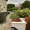 Charmante maison de ville avec jardin et piscine
