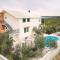 Apartments with a swimming pool Kastel Stafilic, Kastela - 22569