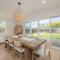 Seaside Home Modern Retreat with Breathtaking Views and Beachside Charm