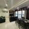 SnugglePod Condotel - Grand Riviera Suites