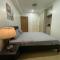 SnugglePod Condotel - Grand Riviera Suites