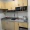 Casa Moanna 2BR Condo with Dining, kitchen, Living Area and Netflix