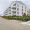 Bright Apartment with Private Garden and Accepting Pets by Noclegi Renters - 格但斯克