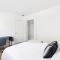 Lovely 2 BR condo with free parking on premises