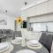 Modern Apartment with Balcony and Parking by Noclegi Renters