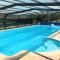 Villa de plain-pied avec WIFI, piscine privée sous abris haut à PLEUMEUR-BODOU - Ref 461