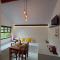 Pousada Sitio Pauletto Chales e Casas com cozinha - 雅里努