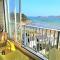 Appartement SUPERBE VUE MER avec terrasse-véranda, WIFI, à TREGASTEL - Réf 90