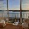 Appartement SUPERBE VUE MER avec terrasse-véranda, WIFI, à TREGASTEL - Réf 90