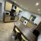 Spacious 2BR Apartment - Sleeps 4 - Parking & Pets - Coast Serviced Apartments - Enquire for Trade & Long stays