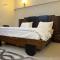 Comfortia Guest House 3 Bed with DringDining - 卡拉奇