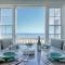 Stunning Waterfront Views Beach steps away