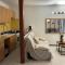 VILLA NATHEO Bas de villa - Studio 37m2 avec Coin nuit