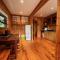Peaceful guest suite with balcony views and garden setting