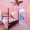 Waterfront Pink House with Private Dock & Pool