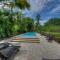 Waterfront Pink House with Private Dock & Pool