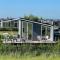 Luxury chalet with covered terrace, in Zeeland