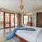 SaffronStays Moringa WishingTree - 3-BR villa near Nathdwara with pool, lawn and hillside views