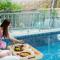 SaffronStays Moringa WishingTree - 3-BR villa near Nathdwara with pool, lawn and hillside views