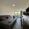 Grey Escape Apartments