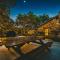 The Camp Blanco by Lodgewell - Riverfront retreat 2 Homes, Bunk House, Game Room & more