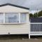 Bright Family Caravan with Deck & BBQ at Seawick Holiday Park, Clacton