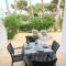 Apartamento Playa Xoriguer con piscina y jardin