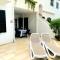 Apartamento Playa Xoriguer con piscina y jardin