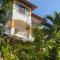 OASIS VILLA Suites & Rooms