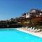 Appartement in Moniga Del Garda mit Grill, Garten und gemeinsamem Pool und Seeblick