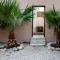 Elegant Garden Stay with 2 Living Areas, 2 Bedrooms, 1 Full and 1 Half Bath for 6 Guests