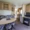 CaravanSleeps8-FirePlace-PetsOk-Golf-Gym-Pool