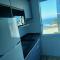 Apartamento frente à praia