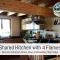 Chalet Weyarn - Doppelzimmer mit Gartenblick