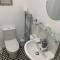 Peaceful garden view double with ensuite in house opposite beach, with access to private garden and bike store